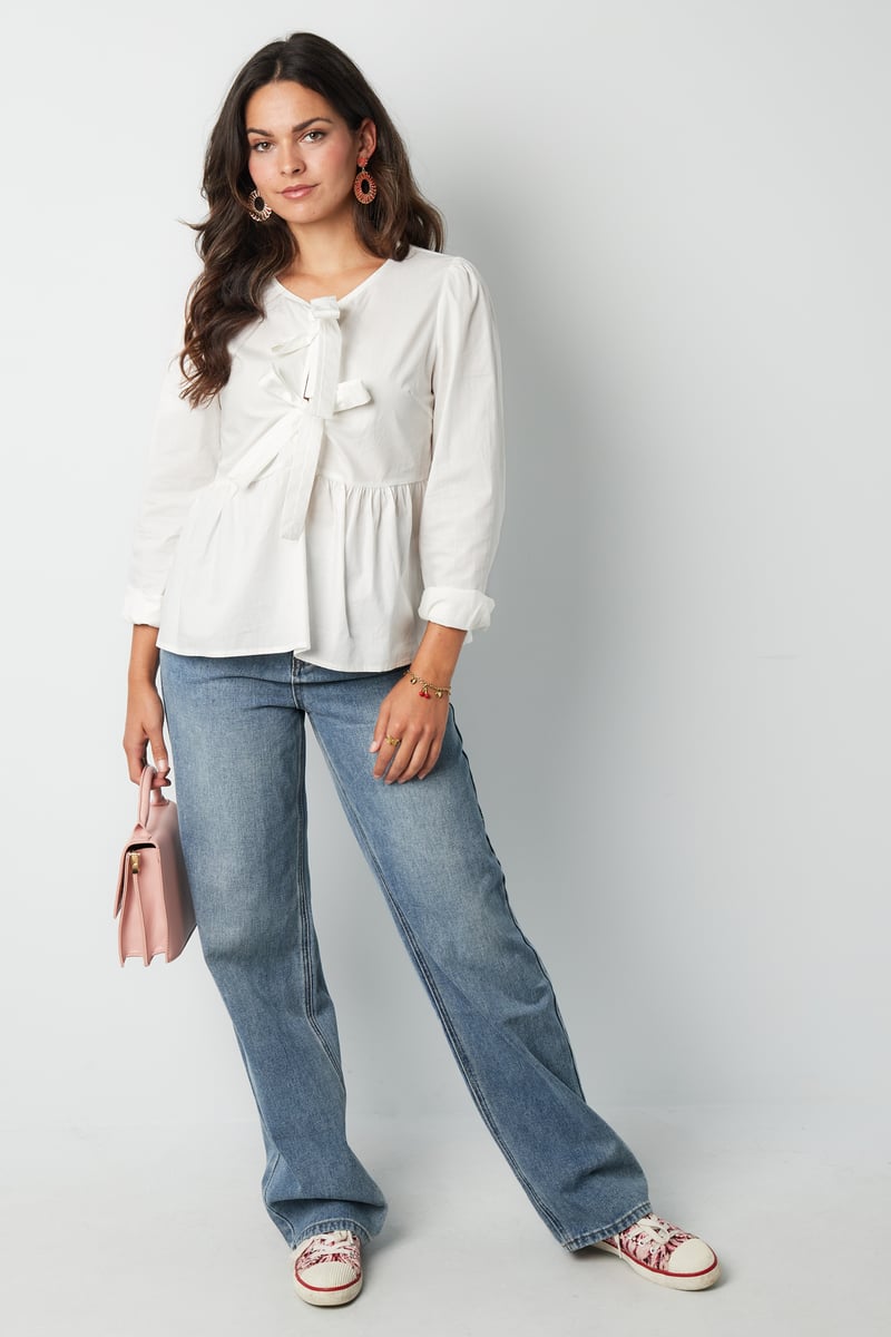 Longsleeve peplum top with bows