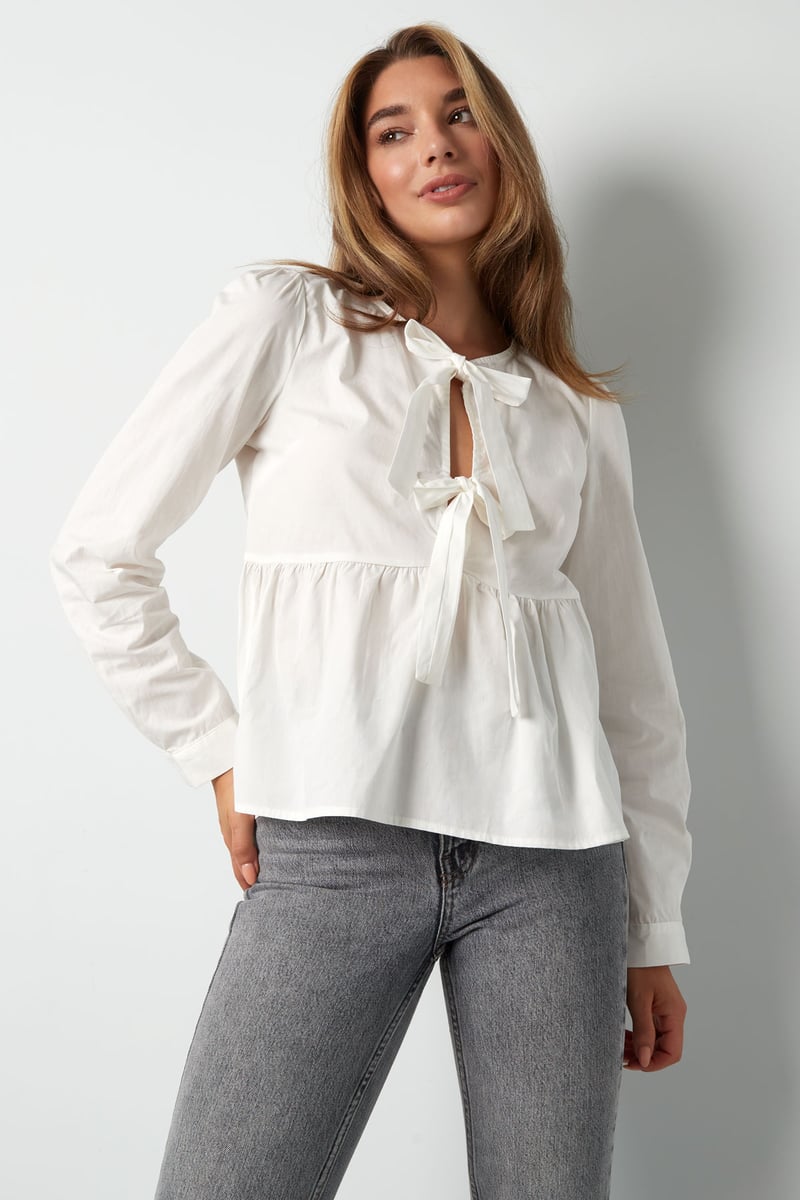 Longsleeve peplum top with bows